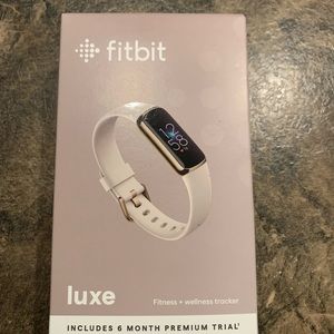 fitbit Luxe soft gold stainless steel case & lunar white band